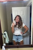 This shirt is perfect! Runs slightly big, but I would still order your same size! I went with a large and it was the perfect fit to tuck/tie. Wore it on the plane for my bachelorette!! Felt so amazing in it! It's super comfy too! Not a cotton material more of a clingy material that doesn't cling. - Courtney P.