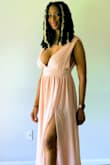 3 layers, heavy material. I am 5'8" and the dress swept the floor. I love my shoes but I do not recommend a jeweled strap shoe. It kept snagging the back of dress. But since the material was good quality, the material snapped back with no tears. I am so happy. - Danielle T.