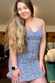 I am absolutely 100% obsessed with this dress! I normally don't write reviews but this dress deserves some recognition. I've come to realize that I have a hard time finding dresses that flatter my body type, but if you have curves or a little "muffin top" like me you definitely need to BUY THIS DRESS! I am typically a Large and it is pretty true to size, the dress has a snug fit in the right places but it is also stretchy and forms to my body. The dress is not as short as I was expecting it to be. It has a darker layer underneath that if you pull it down it doesn't ride back up. I love the ruffles at the bottom and it's adjustable straps. This dress is definitely comfortable and it is a plus that I don't need to wear a bra with it! I will be wearing this dress as it is or with a cardigan depending on the weather. - Hannah M.