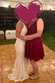 I bought this dress for my reception and loved it. The lace is beautiful, comfortable, and stretchy so I could dance and sit easily, plus I was able to wear a normal bra. Definitely a plus for the larger busted ladies. The dress is very long. I'm just under 5'5" and wearing flip flops in the pic so it is dragging on the ground. I wish I had gotten it hemmed. - Rachel F.