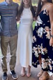 I LOVE this dress! Other than my wedding dress it's my favorite white dress. I wore during my engagement. So flowy and beautiful. I love that it is a tea length dress it was the perfect mix of casual and dressy for my rehearsal dinner! - Kristin J.