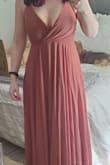 This dress is absolutely beautiful! The quality is fantastic and it's not too heavy. The color is gorgeous, too. The fit is true to size; the XS fit me well. I love that the straps are adjustable - you don't need to wear a bra, which is always a bonus. It's very flowy and just so, so pretty. It's very long, so short girls will need to have it hemmed quite a bit, depending on the shoes you wear, but that's not a big deal. I purchased two dresses for a beach wedding and ultimately went with the other one (the Madalyn dress). It was a tough decision, both are beautiful, but this one shows a bit too much cleavage for me compared to the other style, so that's why I decided to return this one. I'm sad to return it because it really is a lovely dress. - Breanne E.