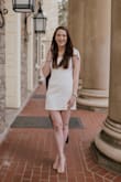 I wore this dress for my college graduation photos. I really like how it looked a little more mature while still having some personality. Its a little short if you're taller, but that's a problem I find is pretty much unavoidable anywhere you shop. The tie straps can help change the length a little bit - Brittany S.