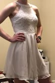 I bought this dress for my graduation, and I'm absolutely blown away by it! Highly recommend! It looks slightly wrinkly in the picture, as I had just gotten it out of the package to try on immediately, so don't be fooled by the picture in that regard! - Tori
