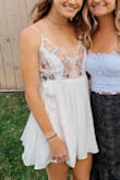 This dress is beautiful and perfect for a variety of occasions! It fit a little large around the chest and torso area for me, but I wouldn't have sized down because the length of the dress. Overall, I am very happy with my decision! - Alliana H.