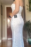 Absolutely love this dress! Fits very well and is even the perfect length before tailoring. Fabric feels very high quality. - Lydia C.