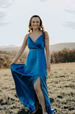 I bought this dress to wear for my photography session with my boyfriend. It's everything I could have imagined! I got sooo many compliments on it. It's so beautiful on !! The only complaint I have is that I wish the chest had some sort of clasp because it's a bit large and loose. - Tyranda C.