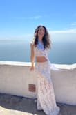 It's such a beautiful dress! I wore it for my bachelorette party in Mexico. As others mentioned the skirt is rather long, and after wearing it once, I decided to hem it. - IRINA L.