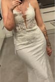 My dream wedding dress!! I am totally in love! The details and it fits perfect through the back lacing. - Laura K.