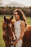 I purchased this dress for a photo shoot with my horse and it was everything I wanted and more! It fit perfectly and the material was fantastic! Definitely recommend getting your size! from previous reviews others had said that it ran small so I ordered up and wished I had gotten my regular size! For reference I am 5'7 125lbs and typically wear a small but ordered a medium- I ended up having to pin the top! but PERFECT! - Maddie C.