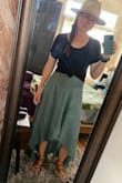 This skirt sits high enough that I feel comfortable and cute postpartum. Love the way it flows in the breeze. It wrinkles when you wear it so give up on that bit. But it works well for the Colorado mountain vibe. - Meredith C.