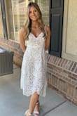 I wore this dress to Prom and got a lot of compliments. It was classy but also different and very beautiful. It fits tight through the rib cage. I had to go up a size to a medium just to get the zipper up. - Brooke L.