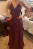 I was super happy with this dress for an upcoming wedding. It is true to size but is a tad long even in an XS. The dress is really comfy and straps are adjustable (yay!). - Charlene R.