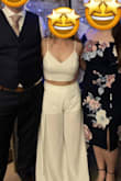 I wore this for my wedding "exit" and got so many complements on it! It fit really well. I should have adjusted the straps to make my boobs a little more lifted, but that was my fault, not the top's fault. - Erika B.