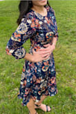 I love this dress. It was a little long but that was a quick fix. I wore it to my son's first communion in May and it was perfect. - Cesarina V.