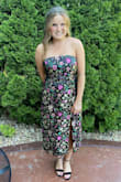 I wore this to prom and everyone came up to me telling me how much they loved my dress. It stood out from the others because it was unique. The material has a sheen to it. The bottom half of the dress runs a bit large so do not size up. - Janet K.