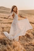 The dress was perfect! I used this dress for my engagement photos. I have more of a square upper body but the dress helped it look less since it flared on the bottom. The straps are not adjustable. - LeeJin N.