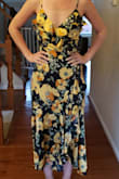 This is a pretty dress but it runs a bit large. I don't think it's the best of you have a small chest. I tried to use the chat feature for sizing, but was put on hold for a very long time. They followed up with me via email, but at that point it was too late. - Allie N.