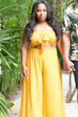 Loved this! Wore it during vacation to Mexico and it was light and comfortable for the hot humid weather. I would say this fits true to size. I am short, so I will probably get this altered for the future because the pants were a bit long. I wore really tall wedges this time, but would love to wear with flats. Overall, I'm pleased with the purchase. Accurate to pictures and color was fabulous! - Morgan H.