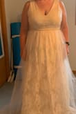 This is a very pretty dress. The extra layer of tulle is just too much for my already heavy-set frame. It looks very bridal...very pretty. Going with another Lulus dress. - Valerie D.