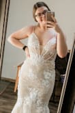 The dress is absolutely beautiful for the price. Due to my measurements I would have technically been a size 8, but due to that being out of stock I got the size 6 and it fit perfectly, now I think if I got the 8 it would be too big. My only negatives are there were some black fuzz on the lace details, the material feels kind of cheap but the price makes up for that it is still comfortable to wear and beautiful, I also wish the zipper was slightly longer; obviously you can't step into it, so you have to put it on over your head and in doing so the material get bunched up in different spots and you have to pull it down and it feels like you're going to rip the dress. - Payton C.
