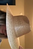 The quality of this hat is incredible!! I was super impressed with how it looked in person. Sadly enough when I tried it in it wasn't exactly the style for me. I am sure it could be cute on other girls who can rock more a western style. It is a very stiff brim, not floppy. - Stephanie L.