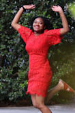 I picked this dress out for graduation. The red matched my school colors, and I have always been a fan of lace. I wouldn't recommend sizing up because the dress is already loose. I did get mine altered because I wanted a tighter look, but the dress looks fine without alterations! - Cassandra G.