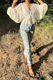 This blouse is suuuuper cute! A bit baggy on the arms, but other that that, it's adorable. - Carissa Q.