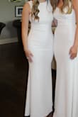 I was hesitant about this dress after I bought it online, but when it got here and I tried it on, I loved it. It was so perfect, very good quality, exactly what I was looking for, and fit me so well. I definitely recommend for a white dress ceremony! This dress is the left one in the picture - Dawn G.