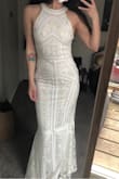 I bought this as a back up wedding dress in case I couldn't find something I liked at a bridal shop. I went with a dress from the shop, BUT this dress is absolutely beautiful and well made! I am keeping it on the off chance I have an opportunity to wear it in the future as it could pass for an evening gown rather than a wedding gown. - Kate L.