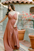 I wore this dress for my engagement pictures and the quality from this dress made my pictures look better! It was a little heavy, which I loved. The front of the dress was a little too low, but I pinned it in 5 minutes and it worked out. I'm petite and was walkable with high heels. - Chastity M.