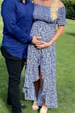 Very cute dress. Received lots of compliments! I was 8 months pregnant but still could have probably worn a small. The medium was fine though. Love the slit - Emily G.