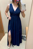 I love this dress! I did have to have it hemmed and I also got the straps taken up a bit because it was looking a little saggy around the breast area. With the alterations the dress fits me perfectly and I don't have to worry about my boobs/bra showing. The slit isn't noticeable unless you want it to be, which I love. - Kayla R.