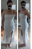 Great dress for a hot location. The fabric is all stretchy, so it hugs the body perfectly. The slit in the front is really a cut out arch that is always open and exposing your leg. The fabric and cut makes it looks more like a beach cover up or vacation dress than everyday wear in my opinion. - Christie S.