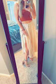 Heavy material, I'm usually a medium, 28" waist, but Sized down to a small so it would sit a tad higher on my waist. So pretty! Needs a good steaming - Kendra S.