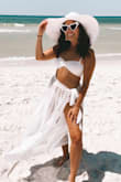 I went through probably 20 different white bathing suits before I found the perfect one. I absolutely loved this top! It's so flattering, hides all "problem" areas while still being sexy and fun! I wore this top on my bachelorette trip & had a ton of compliments. Super cute, super comfy, and totally what I was looking for! - Kimberly C.