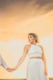 I bought this as a reception dress for my wedding and I didn't think I'd end up wanting to change out of my wedding dress but boy was I wrong. It was so comfortable and I got so many compliments. The medium was a little big on me but small was out of stock. Just do it. I loved this dress! - Hannah P.