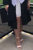 I normally fluctuate between a size 6.5 or 7. After reading the other reviews, I decided to size down and get the 6.5 which fit PERFECTLY! I would say that if you are between sizes, I would recommend you size down. I got the color Taylor White Stacked and it is absolutely gorgeous and neutral to wear with anything! Loved the "wooden" heel instead of the "all white" look. - Kelly T.
