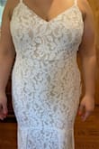 I got this dress for my summer 2021 wedding. I already have my first dress but I wanted a second one in case the other was too heavy and hot for a July wedding. I bought the Flynn White Lace Maxi Dress in size XL and 1XL. I ultimately went with the 1XL. I noticed with the 1XL the pleats on my thighs wouldn't open. With the XL it's almost as the pleated part by my thighs were being stretched opened a little and I didn't like that I preferred a cleaner/a little looser look. This dress makes you feel like a princess and it's extremely comfortable and easy to move in. Due to the fact I'm very short I'm getting the front hemmed and adding buttons to the back of the dress where the zipper is that I found on Amazon for like $10. I also don't mind the adjustable straps on my shoulders if anything I prefer them like that so you can adjust it to what's comfortable to you. Do NOT hesitate and buy the dress trust me! If you have big hips and thighs I recommend you size up 1 size if not go with your regular size. Enjoy! - Jessica P.