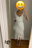 Purchased this for my rehearsal dinner. The dress is very flattering! I ended up wearing a different dress from Macys and retuned this one but I regret it. This dress would have photographed better. I did purchase a white beaded clutch from Lulus though and it was great. - Shanel S.