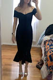This dress fits well and is very flattering. The material is stretchy but supportive - true to size. - Brianna S.