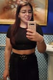 This shirt is VERY soft! I love it. It pairs great with super high-waisted jeans. On me, it fell 2-3 inches below the bottom of my bust, so a bit higher up than the images show. It's also snug on me. Order up a size if you want a loose fit. - Emily R.