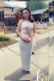 I wore this to my bridal shower, it was beautiful!! The fabric was the most amazing soft but flowy material, was breathable but thick, and the back slit was perfect! Not too high or even close to revealing!! A size 6 was perfect for me, it hit floor length (I wore 4 inch heels and it was foot/ankle length). Definitely recommend! - Allison R.