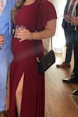 The dress was beautiful and elegant. I wore it to a wedding as a guest and I loved the way I looked in pictures. It's comfortable and flowy. - Jamie F.