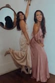 This dress is STUNNING. The dress has a beautiful metallic shine to it. The mauve / pink tone is gorgeous. I received compliments all night!!! Love love love! - Ariane S.