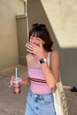 I'm obsessed with this top! It's thick and good quality, beautiful color, and very flattering! Crop isn't too short and is good support for no bra! I ordered a size M - Hannah H.