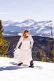 This was the perfect dress for my snowboarding wedding. Yes, I got married in it and then snowboarded down the mountain.  I am short so I needed it hemmed and my seamstress was able to take it up at the drop waist and keep the bottom edge and pleating the way it was designed. She also added a wrist strap which was perfect for the train. I had first tried the XL, as I have never had to order a 1X before, and while it fit ok, it was really tight and I felt a little sausage like. I quickly ordered the next size up and sausage effect was gone. I did wear shapewear under it which helped control my curves a little.
Pros: You can wear a normal bra with this! The material is super comfy and low maintenance, you don't need to worry about it wrinkling or last minute steaming or pressing. The stretchiness made it so comfy. So many compliments on my dress and people are shocked when I brag about how little I spent. I could snowboard in it, so I am sure you can dance 
Cons: I had to remind myself to ignore the size tag. - Amy W.