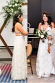 This dress is even prettier in person. I think pictures don't give it justice. I wore this dress for my small wedding. I received a lot of compliments from everyone! If you are planning a small ceremony, elopement. I would recommend you this dress 100%. It's not a heavy dress and the quality of it it's amazing. The dress shines in person. - Alejandra M.