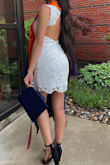 I agree with most of the reviews about the overall fit of the dress. I normally wear a small because I'm tiny but not that tiny. But this dress was constantly in and out of stock and I desperately needed it for graduation. So as soon as even XS came back I jumped onto the opportunity and ordered it. When it came I was surprised that it wasn't too tight or short because I don't typically wear XS. But I had one complaint and no other review warned me about this. I have a decent sized bust but nothing too big. However this dress was pretty dang loose on the top. There was some side boob action going on as well because of the way the arm hole was cut. It was just loose overall from the underarms and back by my neck. I had it altered a little bit very last minute and with the magic of safety pins it fit pretty great, I didn't have a problem with the fabric sticking out on the cutout since it was more fitting. I'd recommend this but if you are even moderately small on the top be aware that you may need alterations. - Jasmeet K.