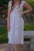 I wore this dress for my confirmation at church and I got a lot of compliments on it. I would recommend it for a more conservative event. Purchased a small, made an easy alteration to the waist. Styled as a cap sleeve. - Michelle M.